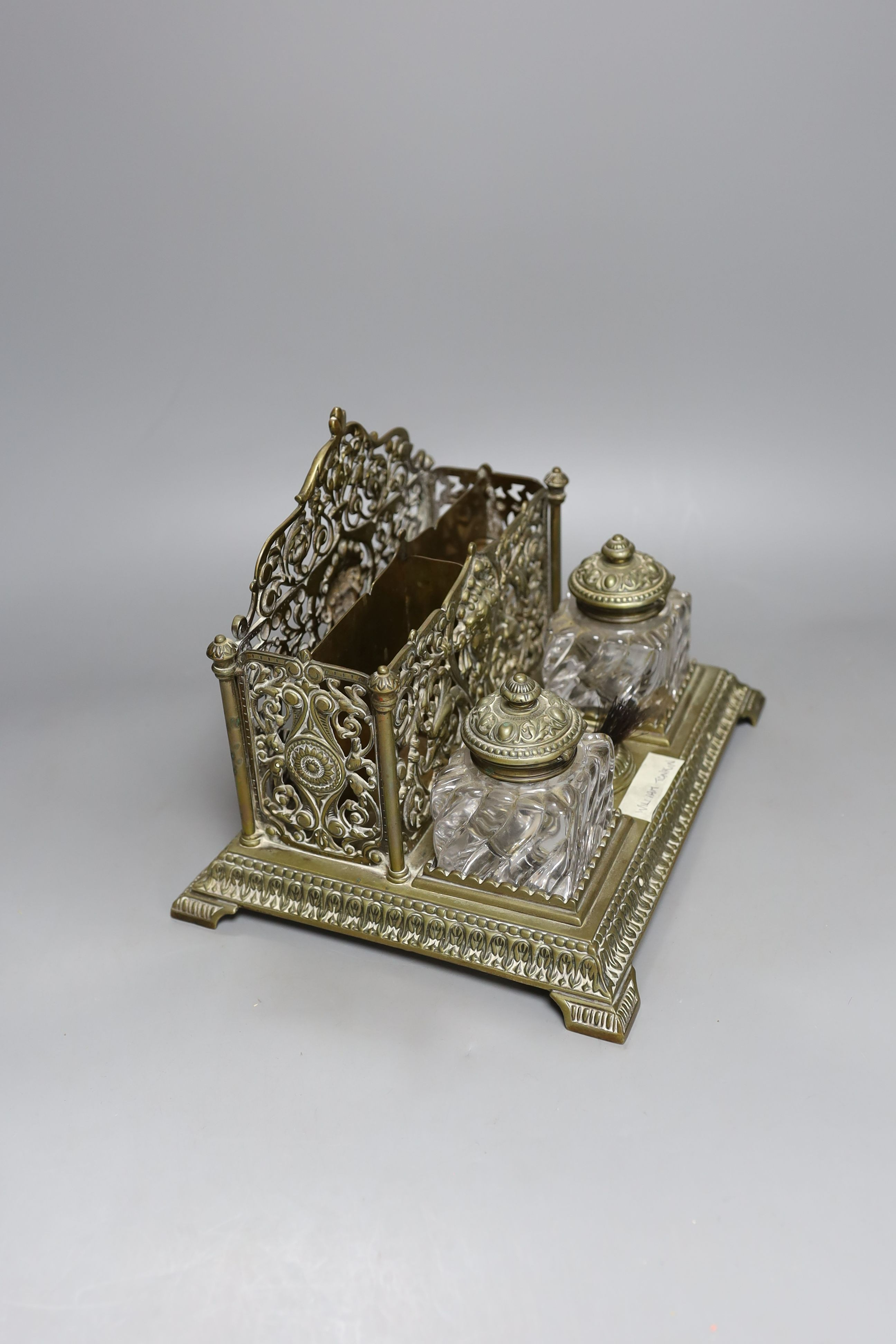 A late 19th century William Tonkin brass 2 bottled ink and letter stand - 27cm long